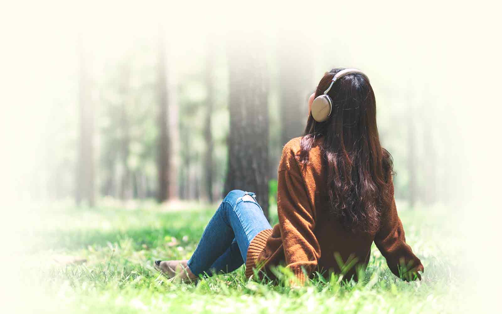 Woman Relaxing Listening to Music with CBD